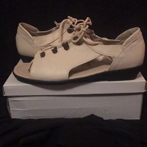 Nude open toe flats